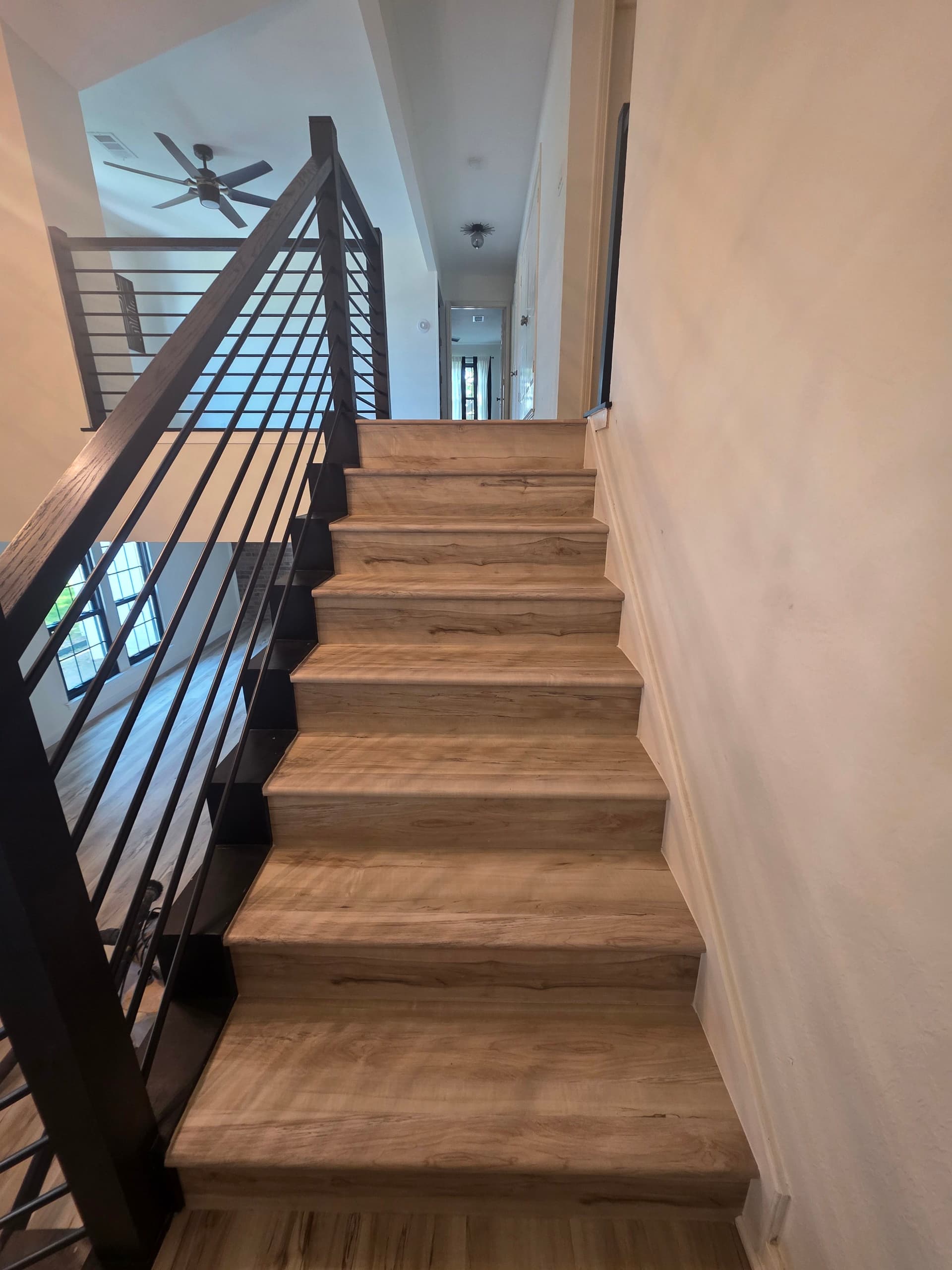 Gallery photos for Worn Carpet and Tile Replaced With Clean LVP Floors: Image #1