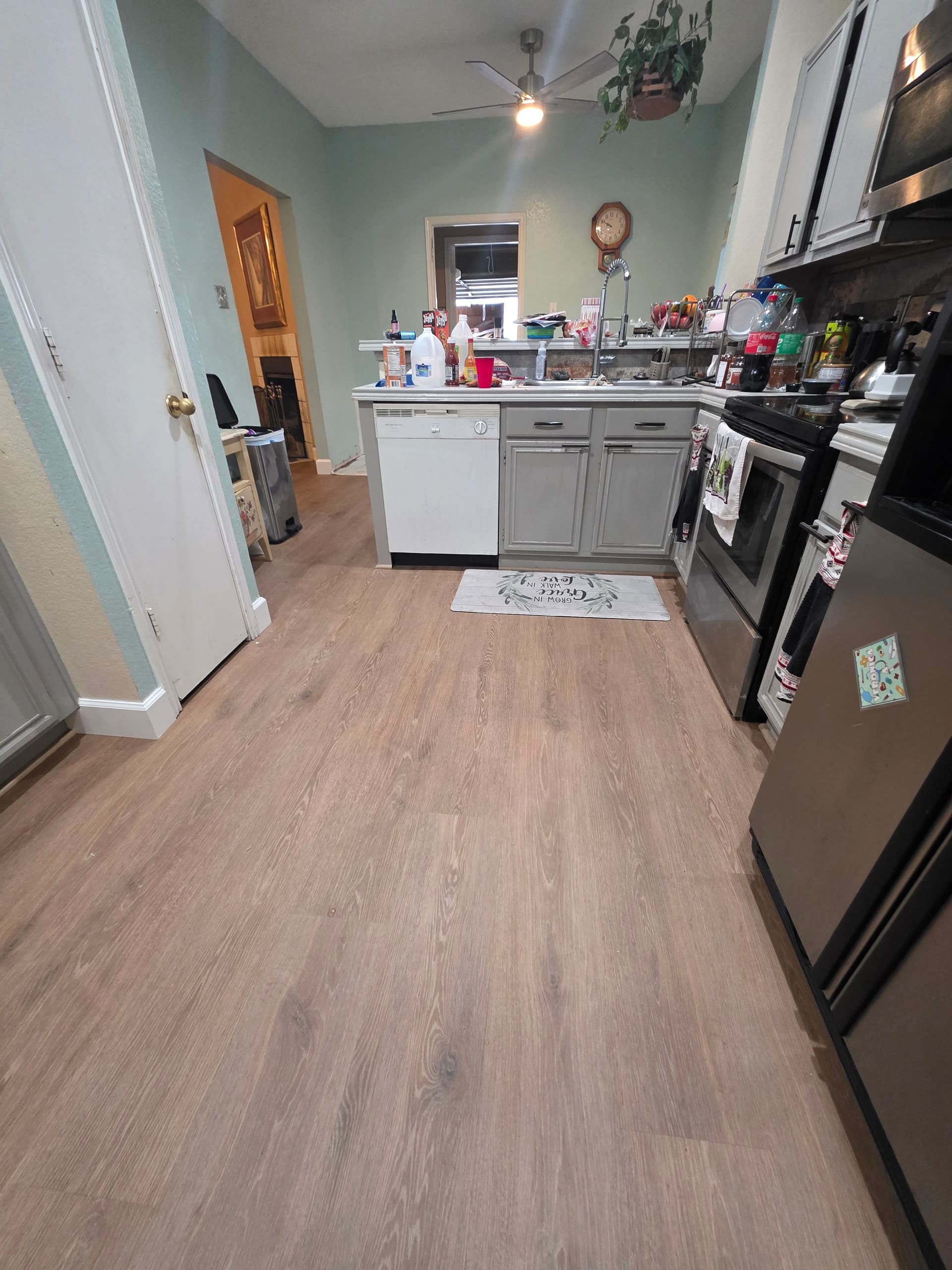 Gallery photos for Living Room and Kitchen Get a Full LVP Floor Overhaul: Image #9