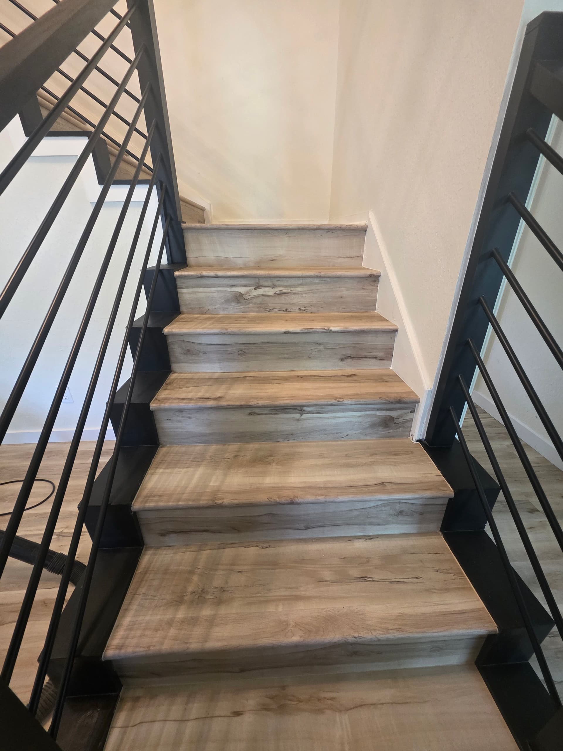 Gallery photos for Worn Carpet and Tile Replaced With Clean LVP Floors: Image #3