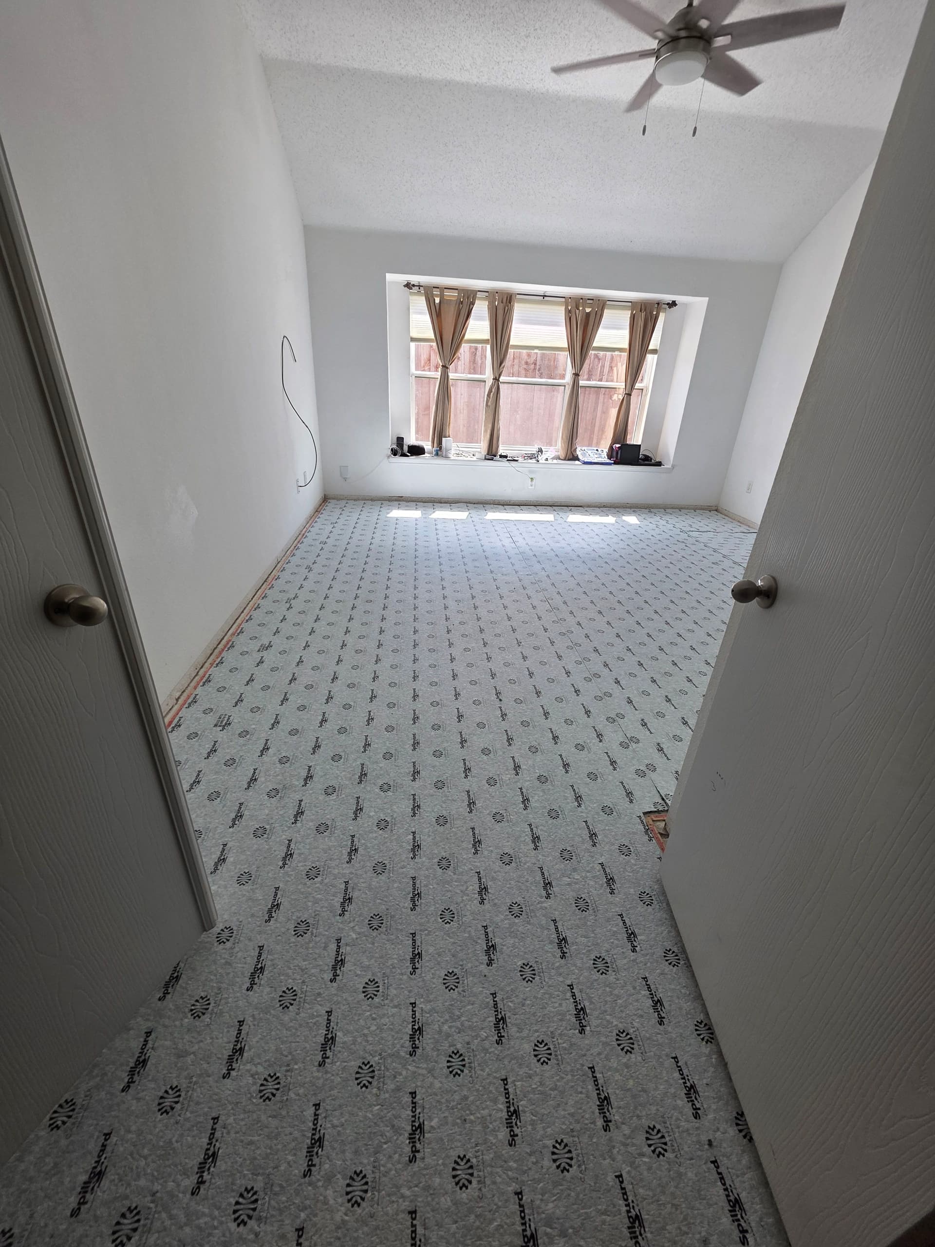 Master Bedroom Mohawk Carpet and Laundry Room LVT Floor Upgrade image