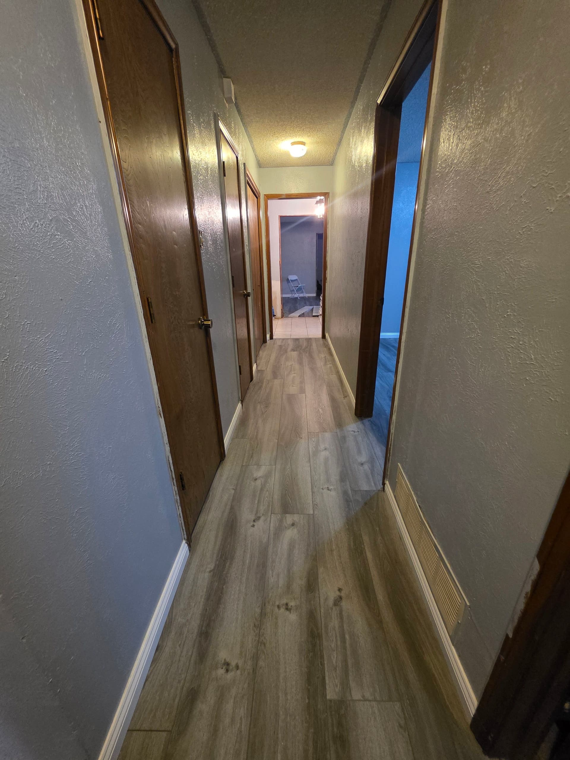 Gallery photos for Stunning Home Renovation with Wood-Look Flooring: Image #3