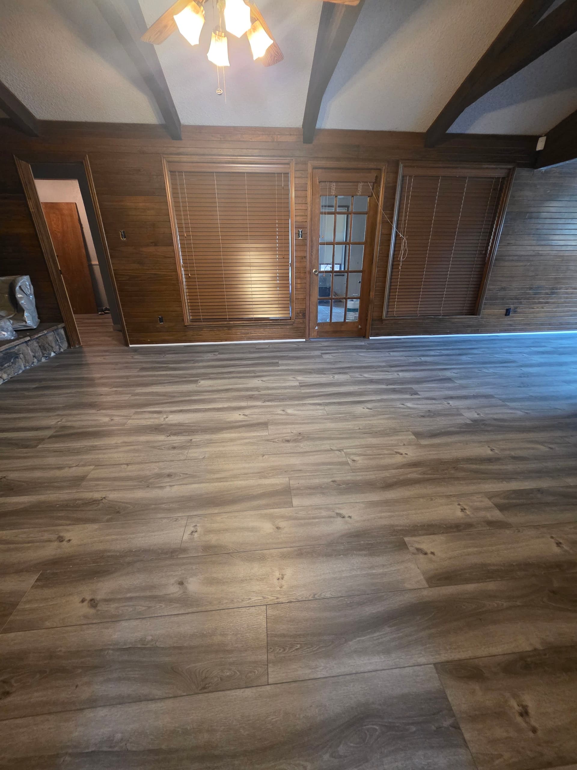 Gallery photos for Stunning Home Renovation with Wood-Look Flooring: Image #1