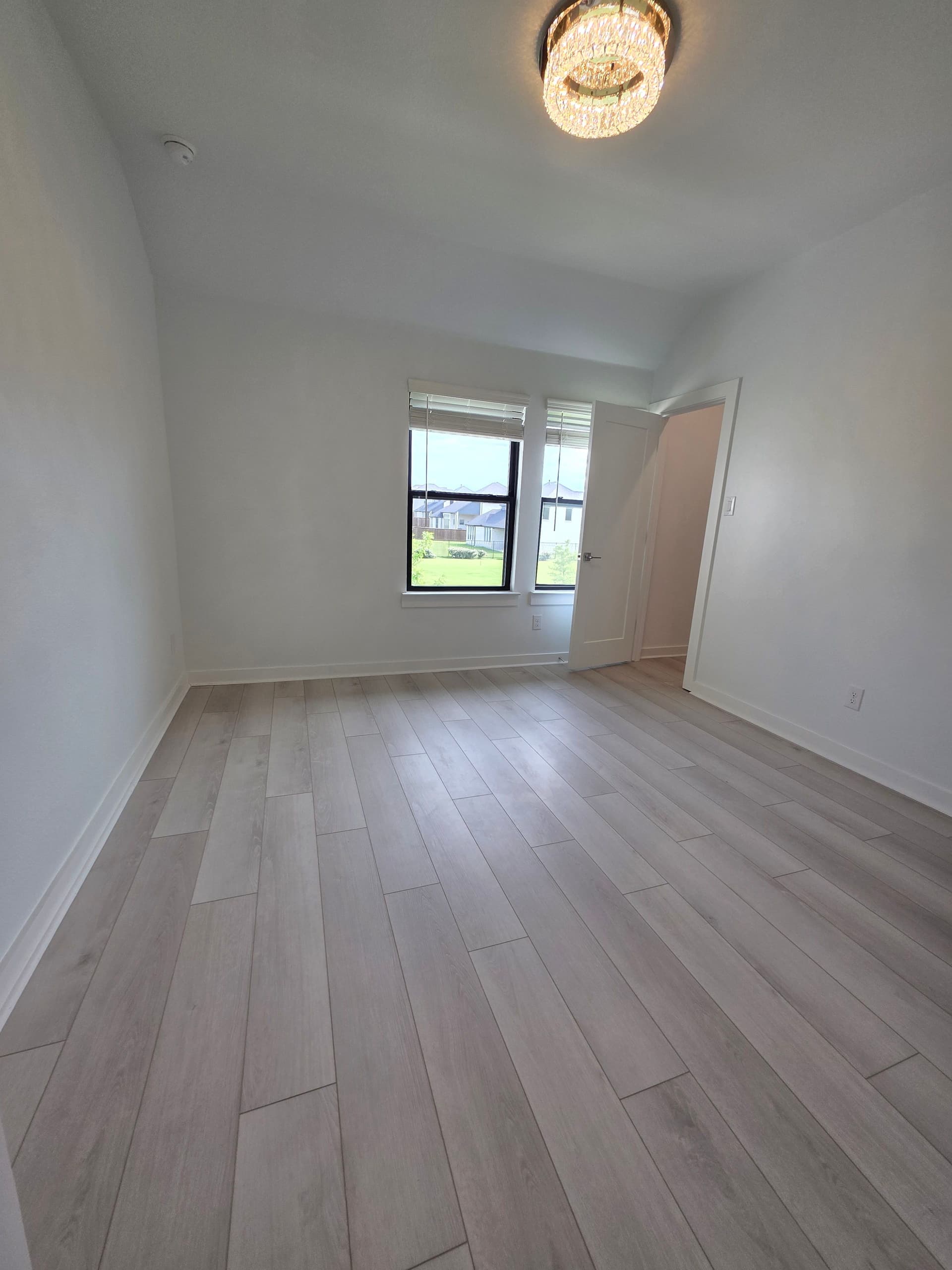 Gallery photos for Frisco Home Goes From Old Carpet to Fresh Wood Flooring: Image #9
