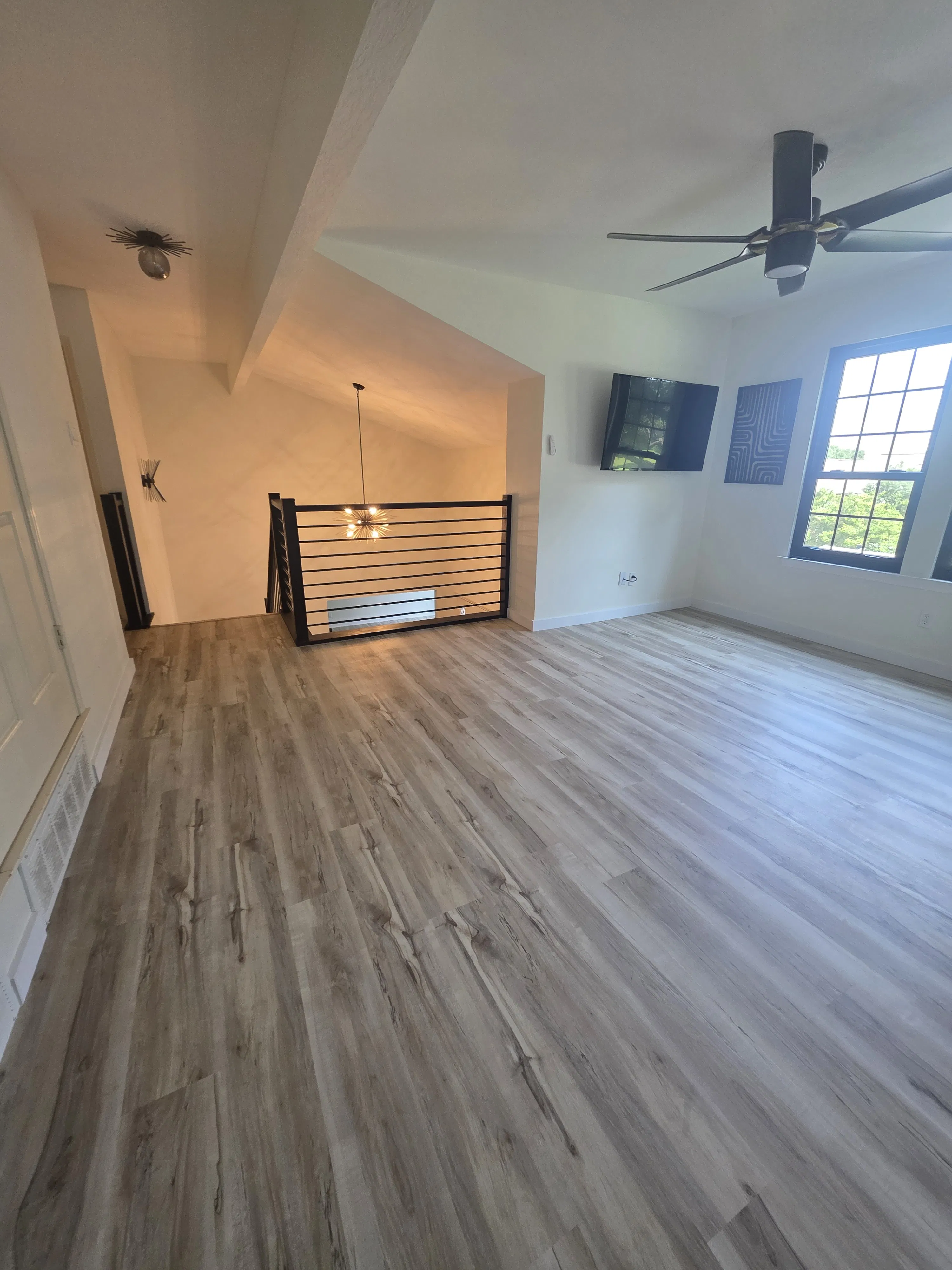 Project Worn Carpet and Tile Replaced With Clean LVP Floors image