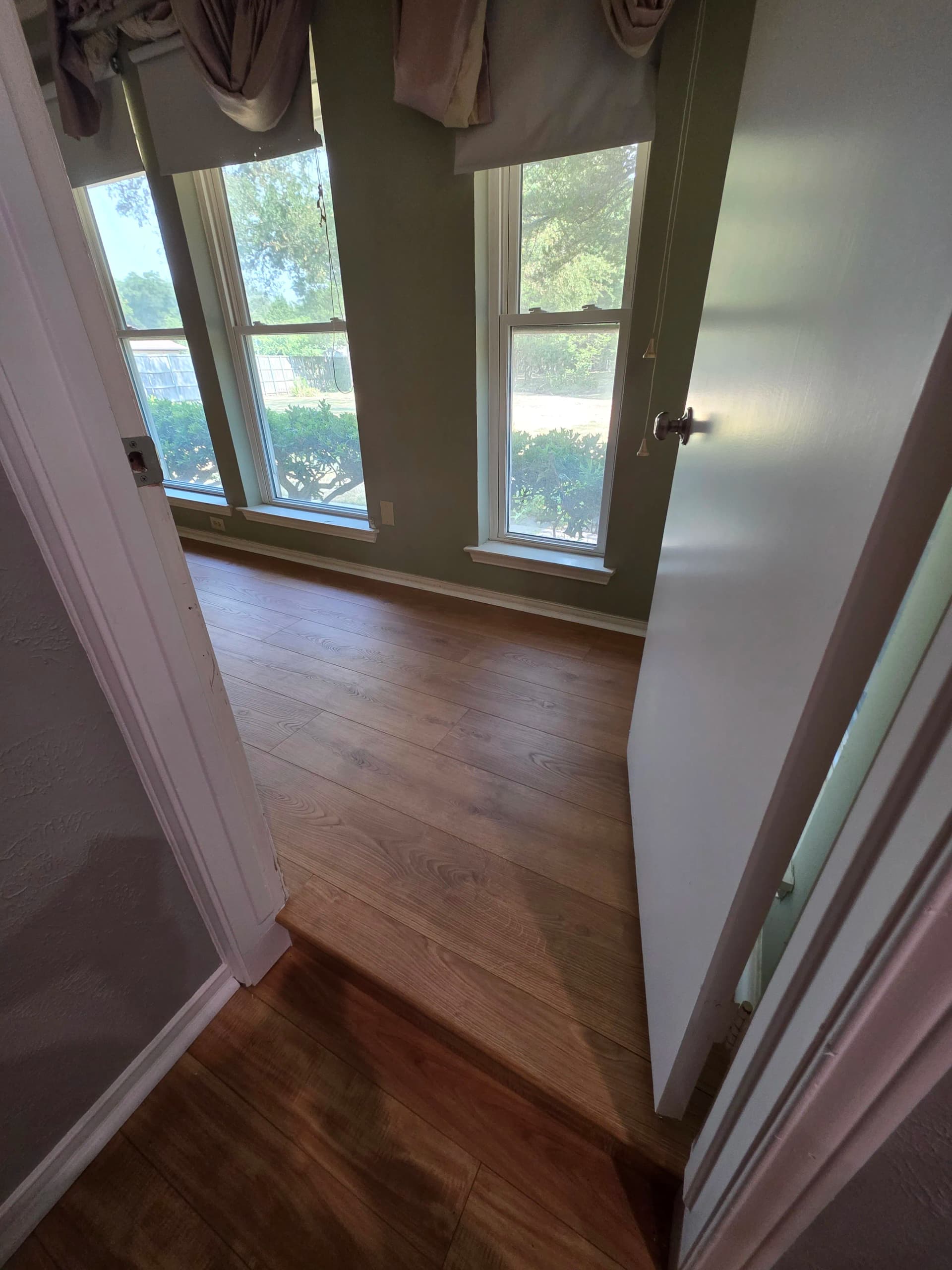 Gallery photos for 12mm Hybrid Flooring Installed in Duncanville Master Bedroom and Closet: Image #7