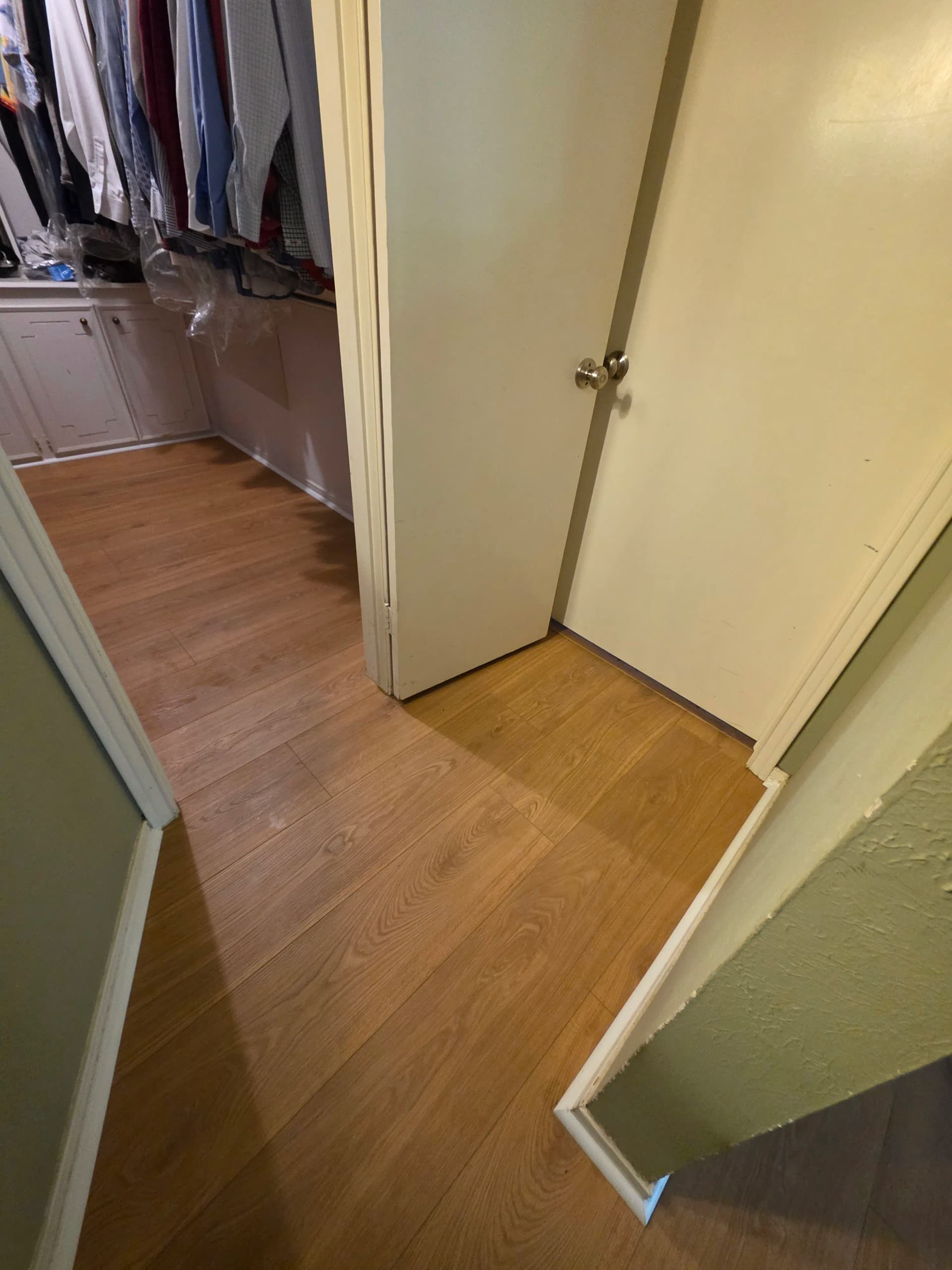 Gallery photos for 12mm Hybrid Flooring Installed in Duncanville Master Bedroom and Closet: Image #6