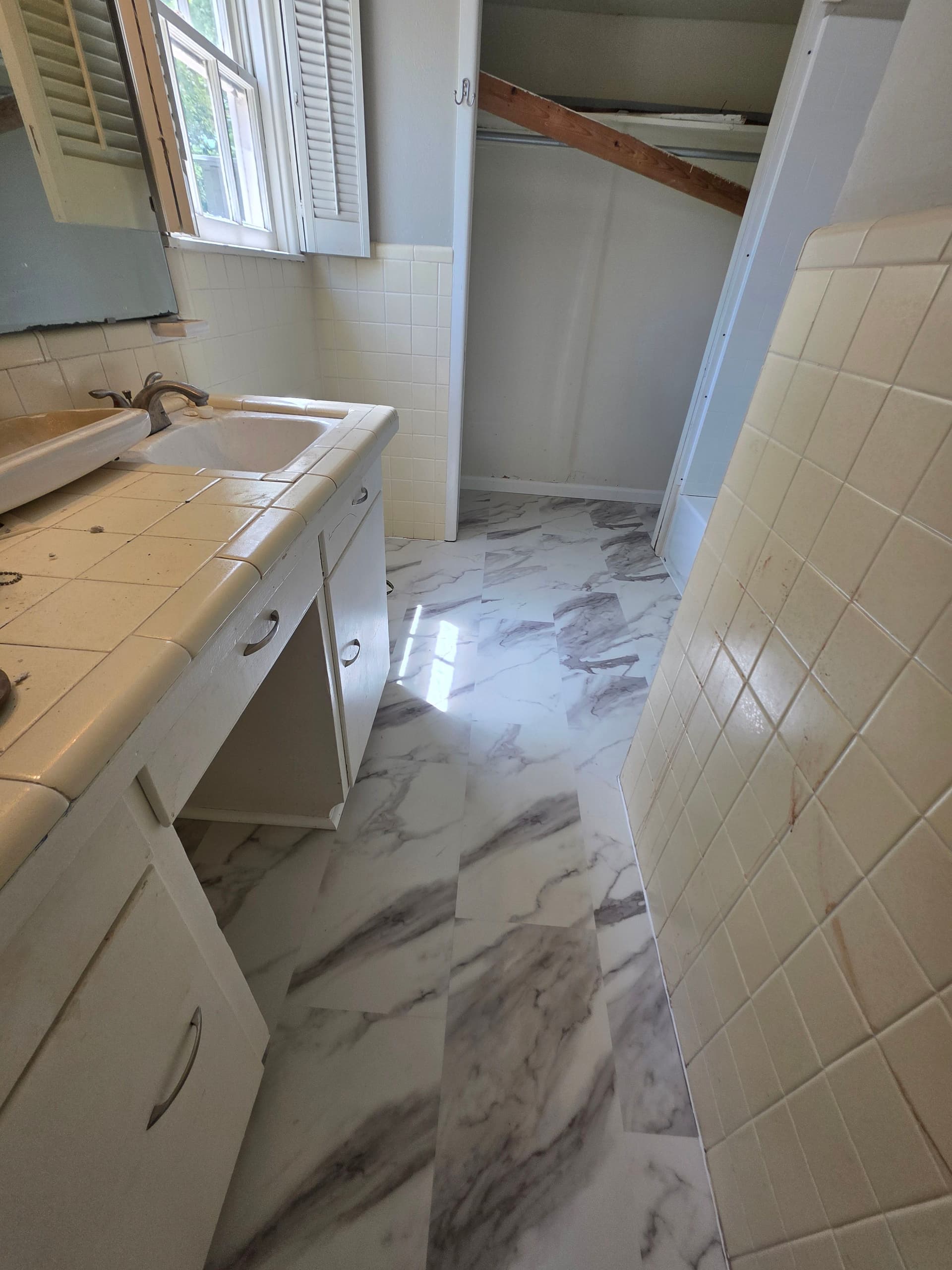 Gallery photos for Worn Hardwood Gets a Full Sand, Stain and LVT Bathroom Upgrade: Image #8
